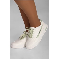 Кроссовки белые с зелеными шнурками