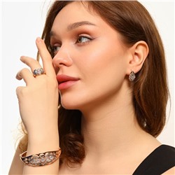 Комплект ювелирной бижутерии: браслет жесткий на руку, серьги и кольцо 17 р, покрытие позолота, вставка: фианиты, цвет: прозрачный, арт.213.479-17