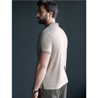 Футболка поло с воротником на пуговтцах из полотна пике с меланжевым плетением с эластаном