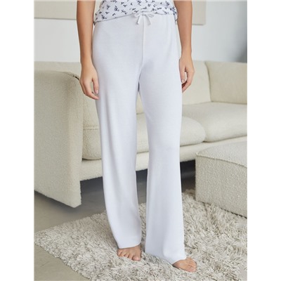 Прямые брюки с поясом на резинке из фактурного трикотажа в рубчик