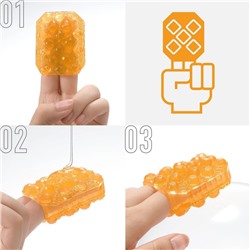 Оранжевый мастурбатор-стимулятор Tenga Uni Topaz