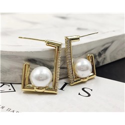 Серьги стильные