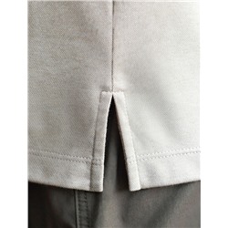 Футболка поло с воротником на пуговтцах из полотна пике с меланжевым плетением с эластаном