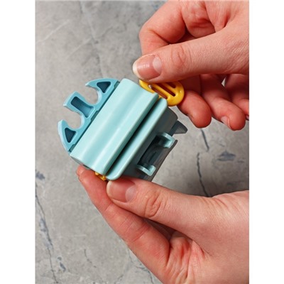 Держатель для зубных щёток с выдавливателем для пасты на липучке, 7×5.2×8 см, цвет МИКС