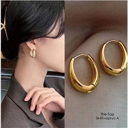 Стильные овальные серьги