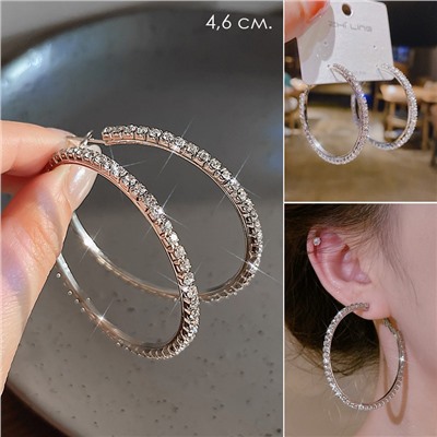 Серьги кольца с сияющими кристаллами 1 пара. Цвет: СЕРЕБРО