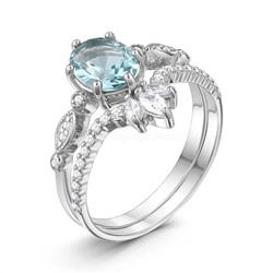 Кольцо двойное из серебра с пл. кварцем цв. Sky топаз и фианитами родированное 925 пробы К-3922рс10200