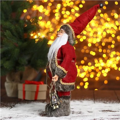 Дед Мороз под ёлку «Зимнее волшебство. Новогодняя игрушка в красном тулупе с фонарём», 30 см