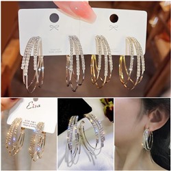 Серьги три кольца с сияющими кристаллами