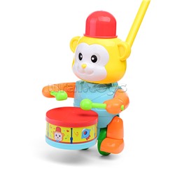 Каталка "Обезьянка барабанщик" в сетке