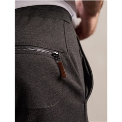 Брюки из тонкого футера с карманом на молнии