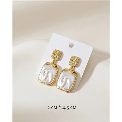 Стильные серьги