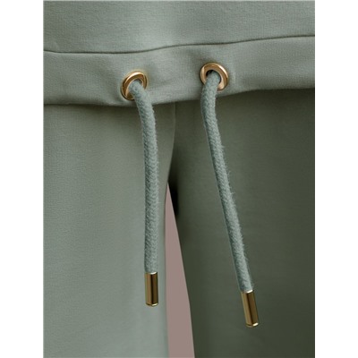 Футболка из тонкого эластичного футера со шнуром внизу