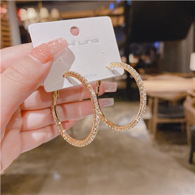 Серьги кольца с сияющими кристаллами 1 пара. Цвет: ЗОЛОТО