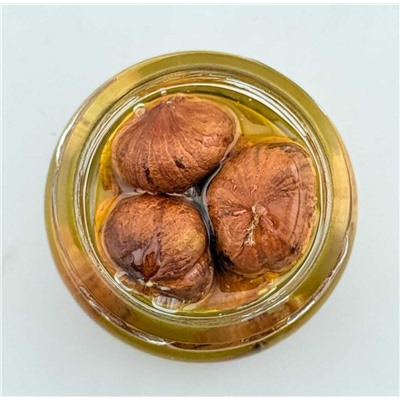 Фундук в меду 35 гр.