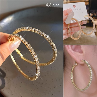 Серьги кольца с сияющими кристаллами 1 пара. Цвет: ЗОЛОТО