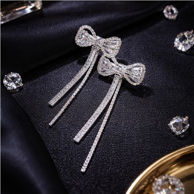 Серьги бантики бижутерия висячие вечерние с камнями, цвет: серебристый и прозрачный, арт.012.074