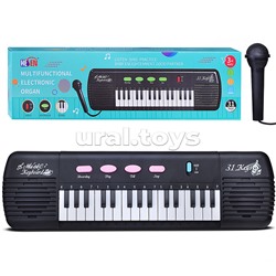 Синтезатор "Юнный композитор" в коробке