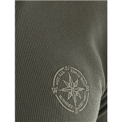 Поло из фактурного трикотажа с застежкой на молнию