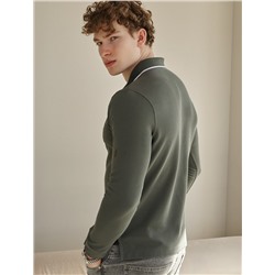 Поло из фактурного трикотажа с застежкой на молнию