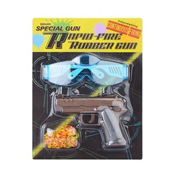 Пистолет "Спецагент" стреляет резинками, на листе