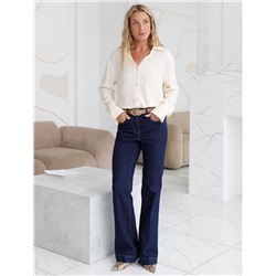 Джинсы клеш от колена из эластичного денима средней плотности