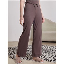 Прямые брюки с поясом на резинке из фактурного трикотажа в рубчик