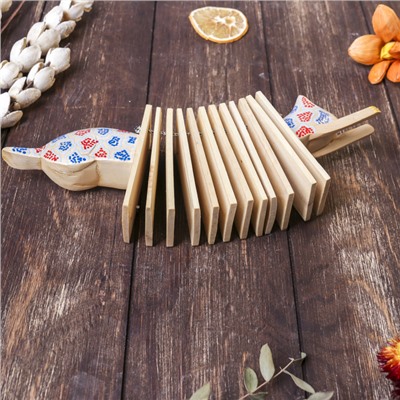 Сувенирный музыкальный инструмент «Трещотка крокодил пятнистый», 4×27×9 см, дерево, МИКС