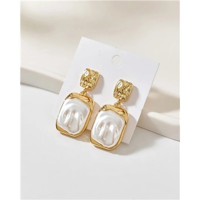 Стильные серьги