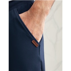 Брюки из тонкого футера с карманом на молнии