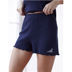 Короткие шорты на резинке с вышивкой из фактурного трикотажа в мелкий рубчик