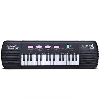 Синтезатор "Юнный композитор" в коробке