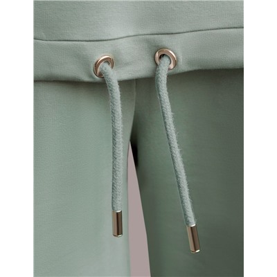 Футболка из тонкого эластичного футера со шнуром внизу