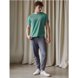 Брюки из тонкого футера с карманом на молнии