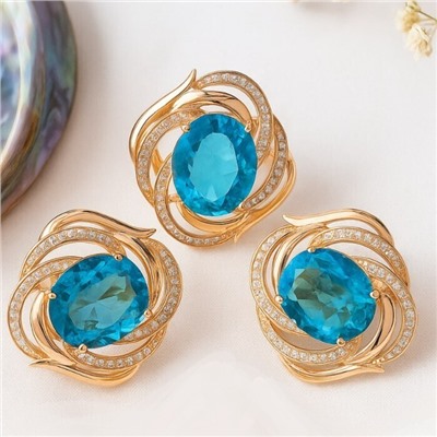 Комплект ювелирной бижутерии коллекция "Дубай" серьги и кольцо 18 р, покрытие позолота, вставка: фианиты, цвет: голубой и прозрачный, арт.215.395-18