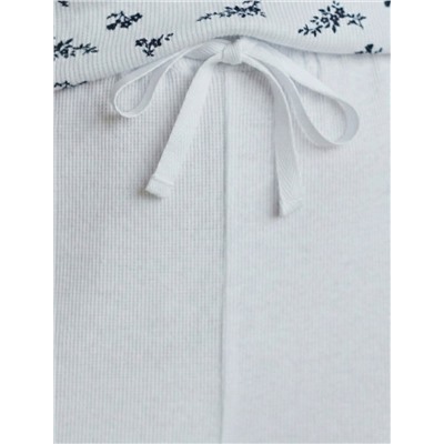 Прямые брюки с поясом на резинке из фактурного трикотажа в рубчик