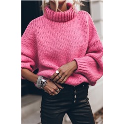 Розовый свитер крупной вязки с высоким воротником