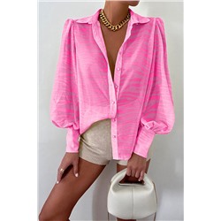 Розовая блузка с ярким цветочным принтом и объемным рукавом
