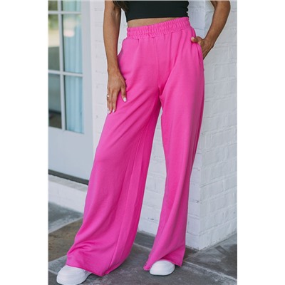 Розовые брюки свободного кроя с эластичным поясом