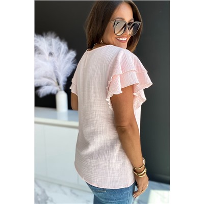 Розовая текстурированная блуза с рюшами на рукавах