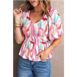 Розовая блуза с абстрактным принтом и V-образным вырезом