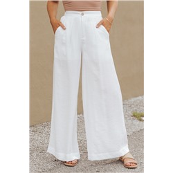 Белые широкие брюки с эластичным поясом и карманами