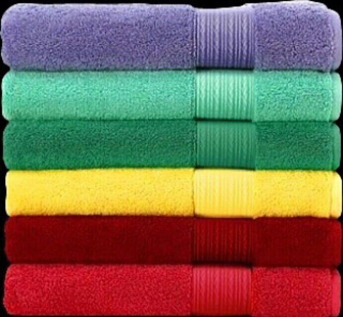 Полотенце уфа. Полотенце 70*140 махра Иваново. Цветные полотенца. Полотенце/разноцветное. Стопка полотенец.