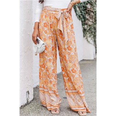 Оранжевые широкие брюки с флористическим принтом в стиле Бохо
