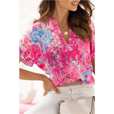 Розовая блуза с флористическим принтом и V-образным вырезом