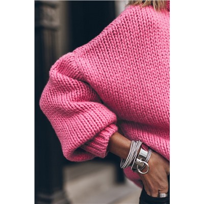 Розовый свитер крупной вязки с высоким воротником