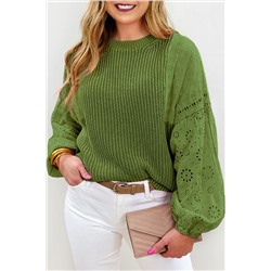 Зеленый свитер с рукавами из шитья