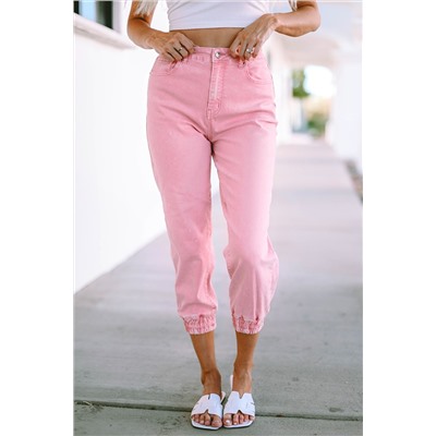 Розовые укороченные джинсы со стиркой и эластичными манжетами